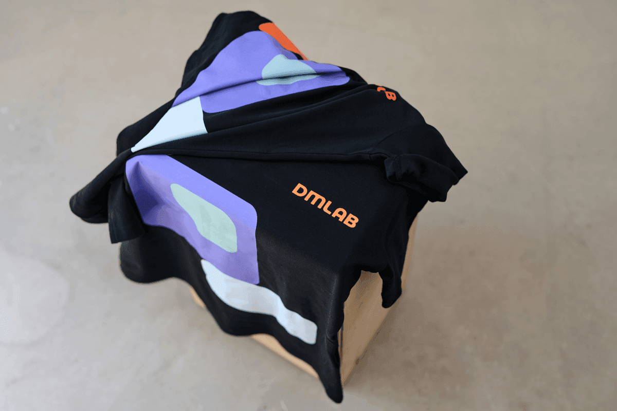 Dmlab shirts on a box
